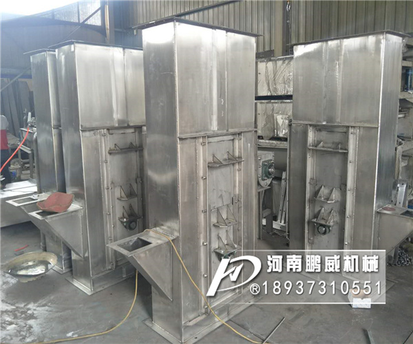 粘性物料斗式提升機料斗沾料有什么辦法可以解決？